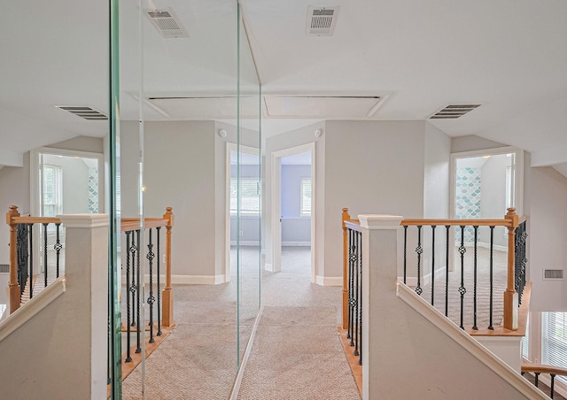 3406 Mesquite Dr, Sugar Land, TX 77479 - corridor featuring an upstairs landing, attic access, light colored carpet, and lofted ceiling