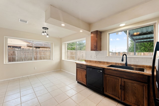8442 Lettie St, Houston, TX 77075 - kitchen featuring dishwasher, a sink, baseboards, light tile patterned floors, and recessed lighting