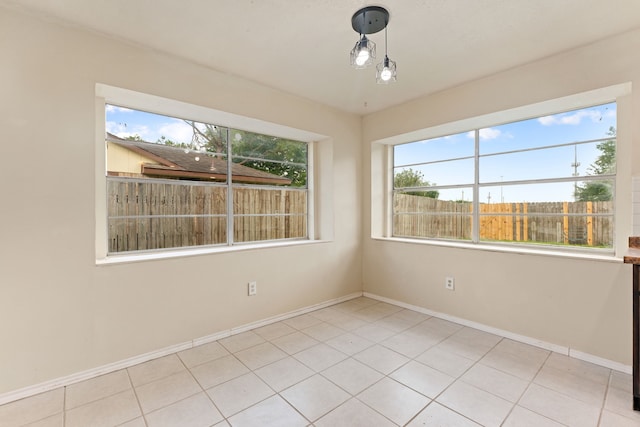 8442 Lettie St, Houston, TX 77075 - empty room with baseboards and tile patterned flooring