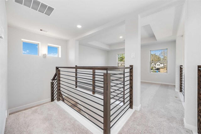 25494 Blossom Ct, Montgomery, TX 77316 - hall featuring an upstairs landing, carpet flooring, a raised ceiling, baseboards, and recessed lighting