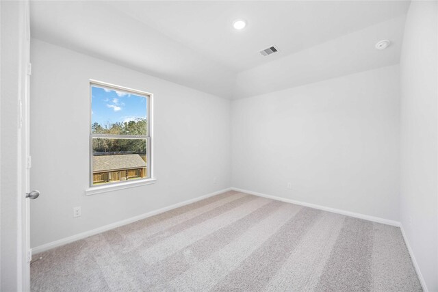 25494 Blossom Ct, Montgomery, TX 77316 - carpeted spare room with baseboards, recessed lighting, a smoke detector, and lofted ceiling