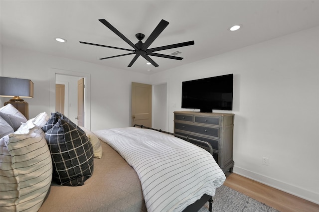 10090 Valley Dr S, Willis, TX 77318 - bedroom with recessed lighting, ceiling fan, light wood-style floors, and baseboards