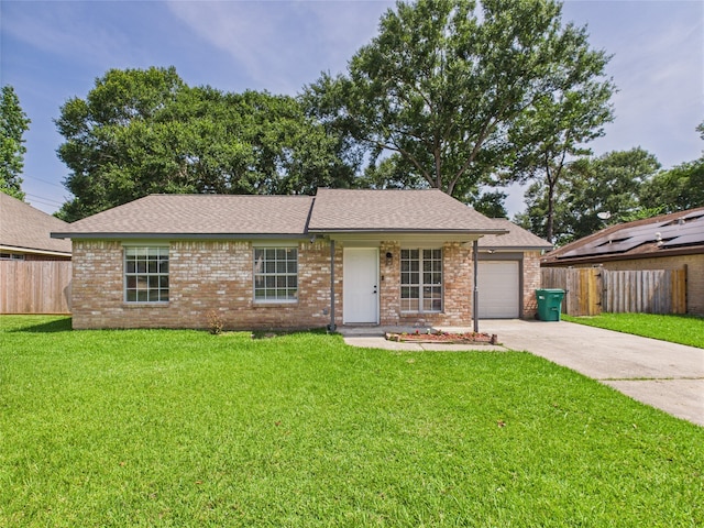 3219 Ricewood Dr, Porter, TX 77365 - single story home featuring concrete driveway, an attached garage, brick siding, and roof with shingles