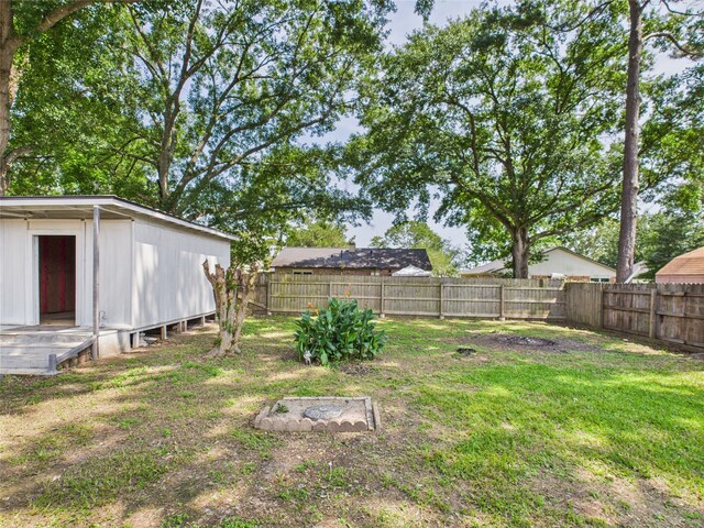 3219 Ricewood Dr, Porter, TX 77365 - view of yard featuring an outdoor structure