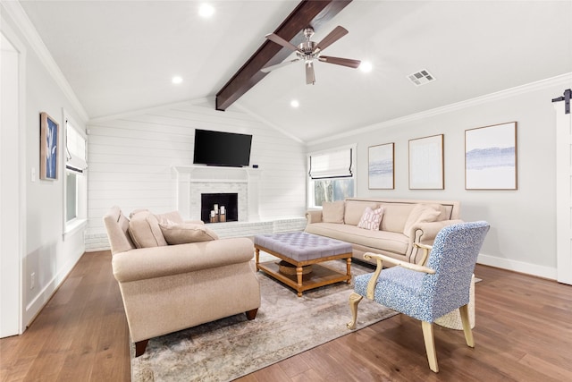 10618 Cranbrook Rd, Houston, TX 77042 - living area featuring ceiling fan, wood finished floors, crown molding, a fireplace, and baseboards