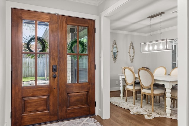 10618 Cranbrook Rd, Houston, TX 77042 - foyer featuring french doors, wood finished floors, ornamental molding, and baseboards