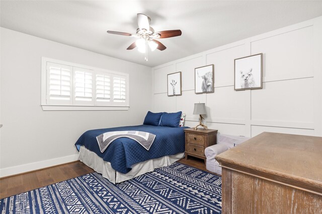 10618 Cranbrook Rd, Houston, TX 77042 - bedroom featuring wood finished floors, baseboards, and ceiling fan