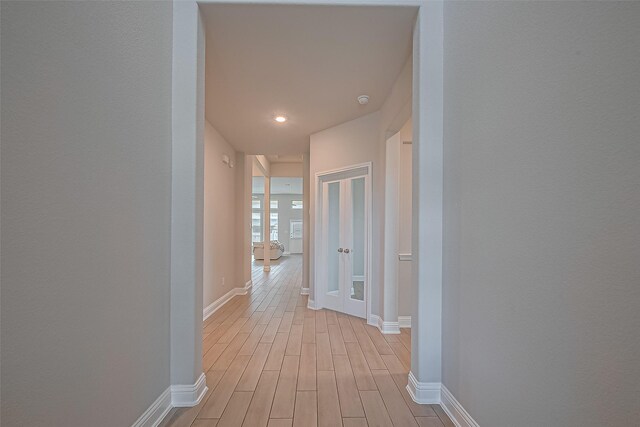 1718 Pepper Grove Ln, Katy, TX 77494 - hallway featuring light wood-type flooring, baseboards, and recessed lighting