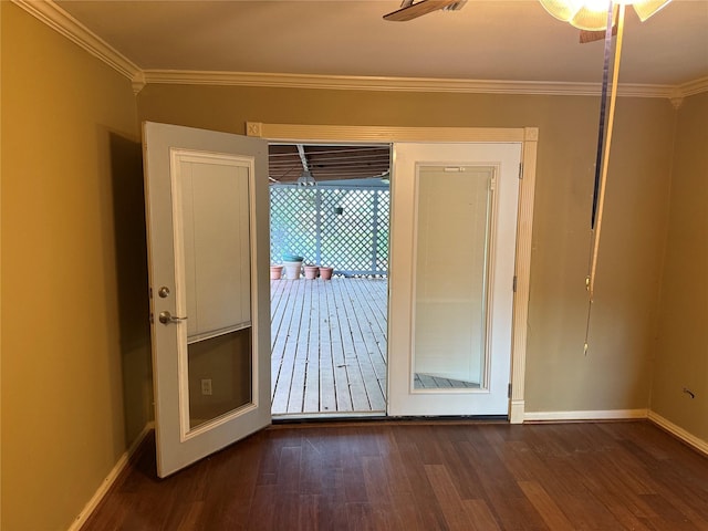 1707 Key St, Waller, TX 77484 - empty room with dark wood finished floors, crown molding, baseboards, and ceiling fan
