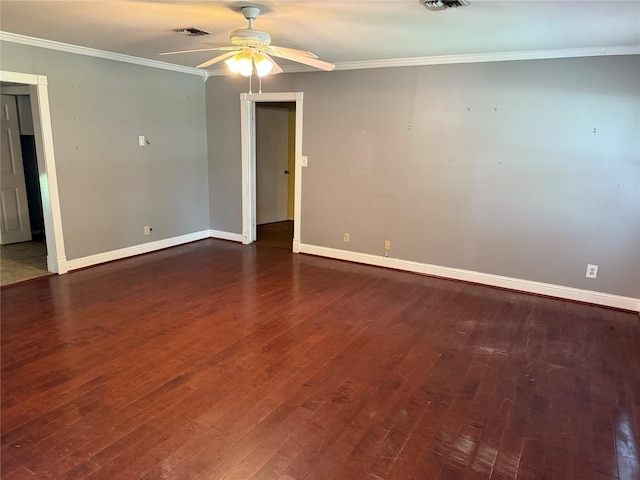 1707 Key St, Waller, TX 77484 - spare room featuring baseboards, a ceiling fan, dark wood-type flooring, and ornamental molding