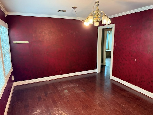 1707 Key St, Waller, TX 77484 - spare room with a chandelier, baseboards, wood finished floors, and ornamental molding