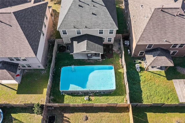 9915 Chimney Swift Ln, Conroe, TX 77385 - view of subject property featuring a pool