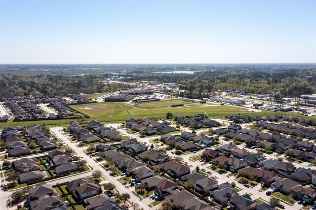 9915 Chimney Swift Ln, Conroe, TX 77385 - aerial view of property and surrounding area with nearby suburban area