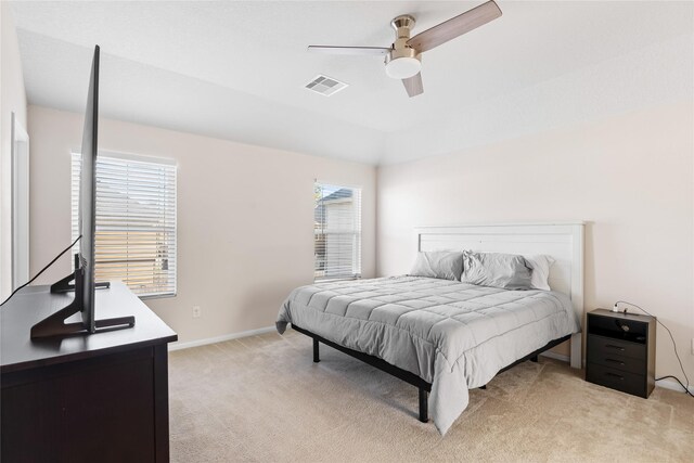9915 Chimney Swift Ln, Conroe, TX 77385 - bedroom featuring light colored carpet, a ceiling fan, and baseboards