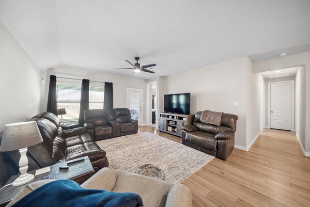 512 Highland Thicket Dr, Montgomery, TX 77316 - living room featuring ceiling fan, light wood finished floors, attic access, baseboards, and vaulted ceiling