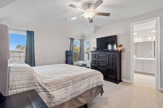 512 Highland Thicket Dr, Montgomery, TX 77316 - bedroom featuring light colored carpet, ceiling fan, connected bathroom, and lofted ceiling