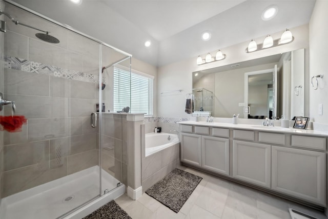 512 Highland Thicket Dr, Montgomery, TX 77316 - bathroom with a stall shower, double vanity, a bath, and recessed lighting
