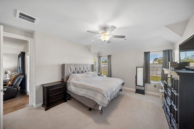 512 Highland Thicket Dr, Montgomery, TX 77316 - bedroom with light carpet, baseboards, and a ceiling fan