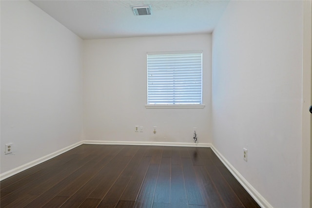 9910 Kent Towne Ln, Sugar Land, TX 77498 - spare room with hardwood / wood-style floors and baseboards