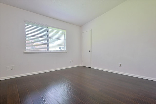 9910 Kent Towne Ln, Sugar Land, TX 77498 - empty room with dark wood-style floors and baseboards