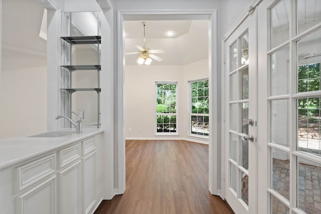 110 Canterbury Green Dr, Conroe, TX 77356 - corridor featuring dark wood-style flooring, french doors, and ornamental molding