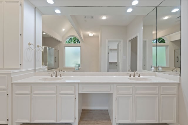 110 Canterbury Green Dr, Conroe, TX 77356 - bathroom featuring a stall shower, double vanity, and recessed lighting