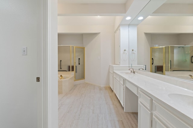 110 Canterbury Green Dr, Conroe, TX 77356 - bathroom featuring double vanity, a stall shower, a bath, and recessed lighting