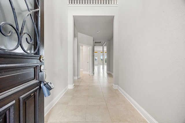 18738 Fox Kestrel Trl, Cypress, TX 77429 - entryway featuring light tile patterned floors and baseboards