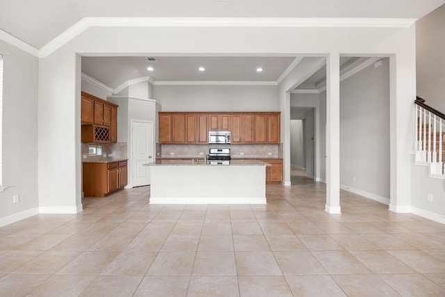 18738 Fox Kestrel Trl, Cypress, TX 77429 - kitchen featuring stainless steel appliances, brown cabinets, decorative backsplash, light tile patterned flooring, and lofted ceiling