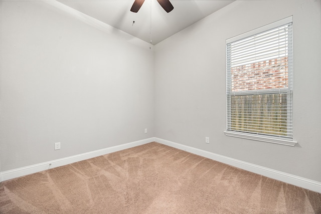 18738 Fox Kestrel Trl, Cypress, TX 77429 - unfurnished room featuring light carpet, ceiling fan, baseboards, and lofted ceiling