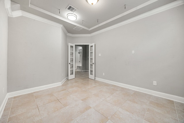 18738 Fox Kestrel Trl, Cypress, TX 77429 - tiled spare room with a tray ceiling, ornamental molding, french doors, and baseboards