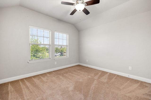 18738 Fox Kestrel Trl, Cypress, TX 77429 - carpeted empty room with vaulted ceiling, a ceiling fan, and baseboards