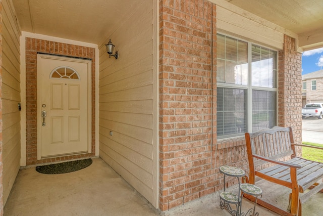4609 Woodspring Acres Ct, Kingwood, TX 77345 - entrance to property with brick siding and covered porch
