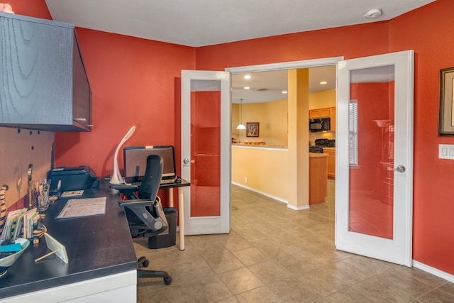4609 Woodspring Acres Ct, Kingwood, TX 77345 - office area with light tile patterned flooring, french doors, and baseboards
