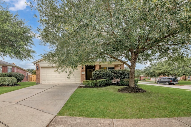 4609 Woodspring Acres Ct, Kingwood, TX 77345 - obstructed view of property featuring brick siding, driveway, a front yard, and a garage