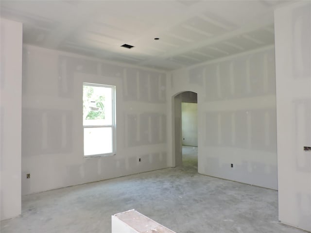 4118 Bear Creek Trce, Baytown, TX 77521 - unfurnished room featuring arched walkways and concrete flooring
