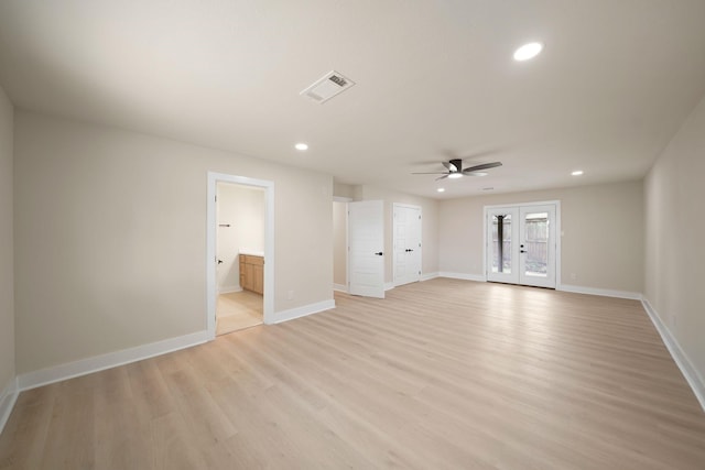 15322 E Barbara Cir, Houston, TX 77071 - spare room with a ceiling fan, light wood-style flooring, french doors, and recessed lighting