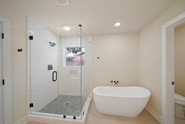 15322 E Barbara Cir, Houston, TX 77071 - bathroom featuring a soaking tub, a stall shower, recessed lighting, and tile patterned flooring