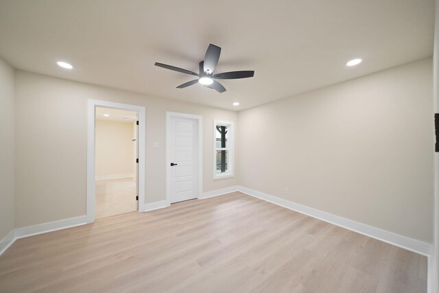 15322 E Barbara Cir, Houston, TX 77071 - spare room with a ceiling fan, light wood-style flooring, and recessed lighting
