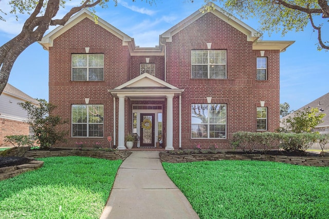 16618 S Swirling Cloud Ct, Cypress, TX 77433 - view of front of home with brick siding and a front yard