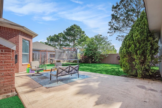 16618 S Swirling Cloud Ct, Cypress, TX 77433 - view of patio with a trampoline