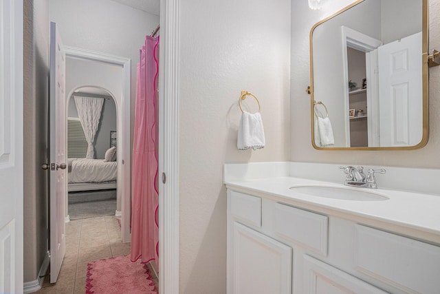 16618 S Swirling Cloud Ct, Cypress, TX 77433 - ensuite bathroom featuring tile patterned flooring and vanity