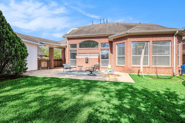16618 S Swirling Cloud Ct, Cypress, TX 77433 - rear view of property featuring brick siding, a patio area, and roof with shingles