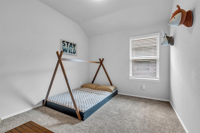 2322 Strong Horse Dr, Conroe, TX 77301 - bedroom featuring carpet flooring, vaulted ceiling, and baseboards