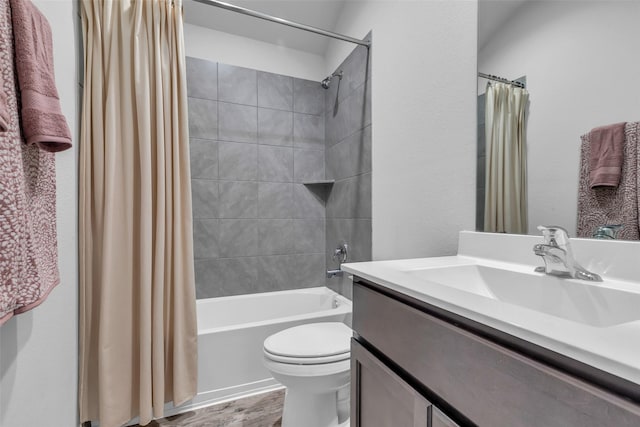 2322 Strong Horse Dr, Conroe, TX 77301 - full bathroom with vanity, shower / bath combo, toilet, and wood finished floors