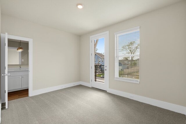5626 Bertellis Ln, Houston, TX 77091 - empty room featuring carpet floors and baseboards
