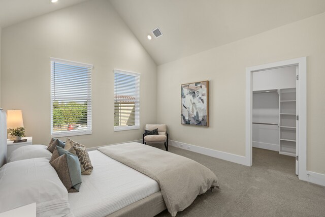 5626 Bertellis Ln, Houston, TX 77091 - bedroom with a spacious closet, baseboards, carpet, high vaulted ceiling, and recessed lighting