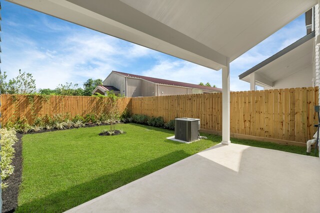 5626 Bertellis Ln, Houston, TX 77091 - view of yard featuring central AC unit and a patio area