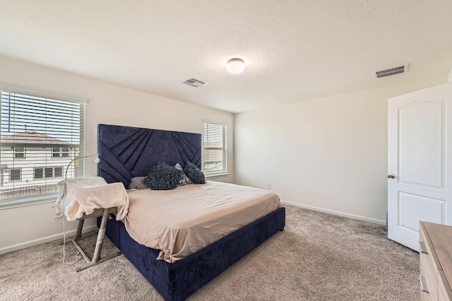 8126 Coco Bluff Dr, Cypress, TX 77433 - bedroom featuring carpet floors, baseboards, and a textured ceiling
