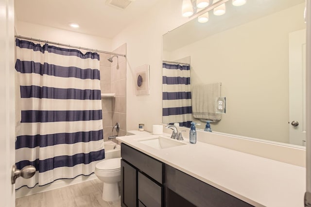 8126 Coco Bluff Dr, Cypress, TX 77433 - bathroom with toilet, vanity, and shower / tub combo